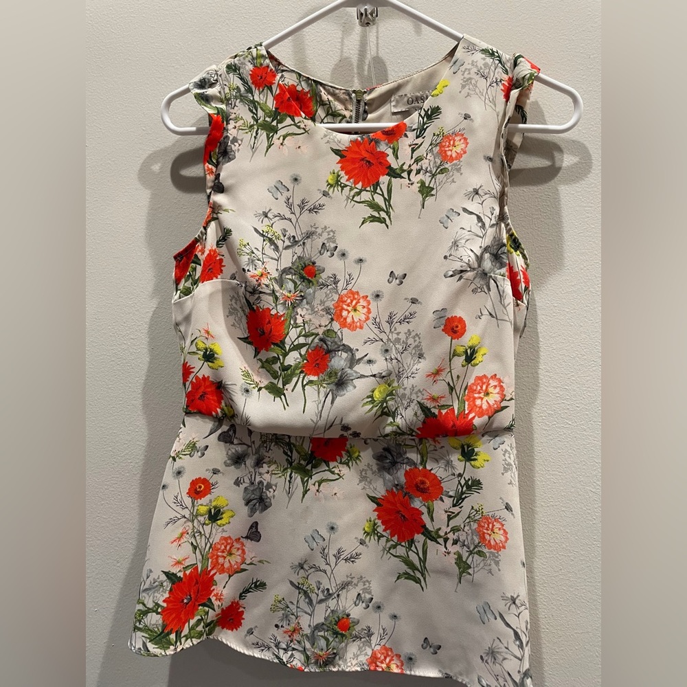 Floral sleeveless summer blouse